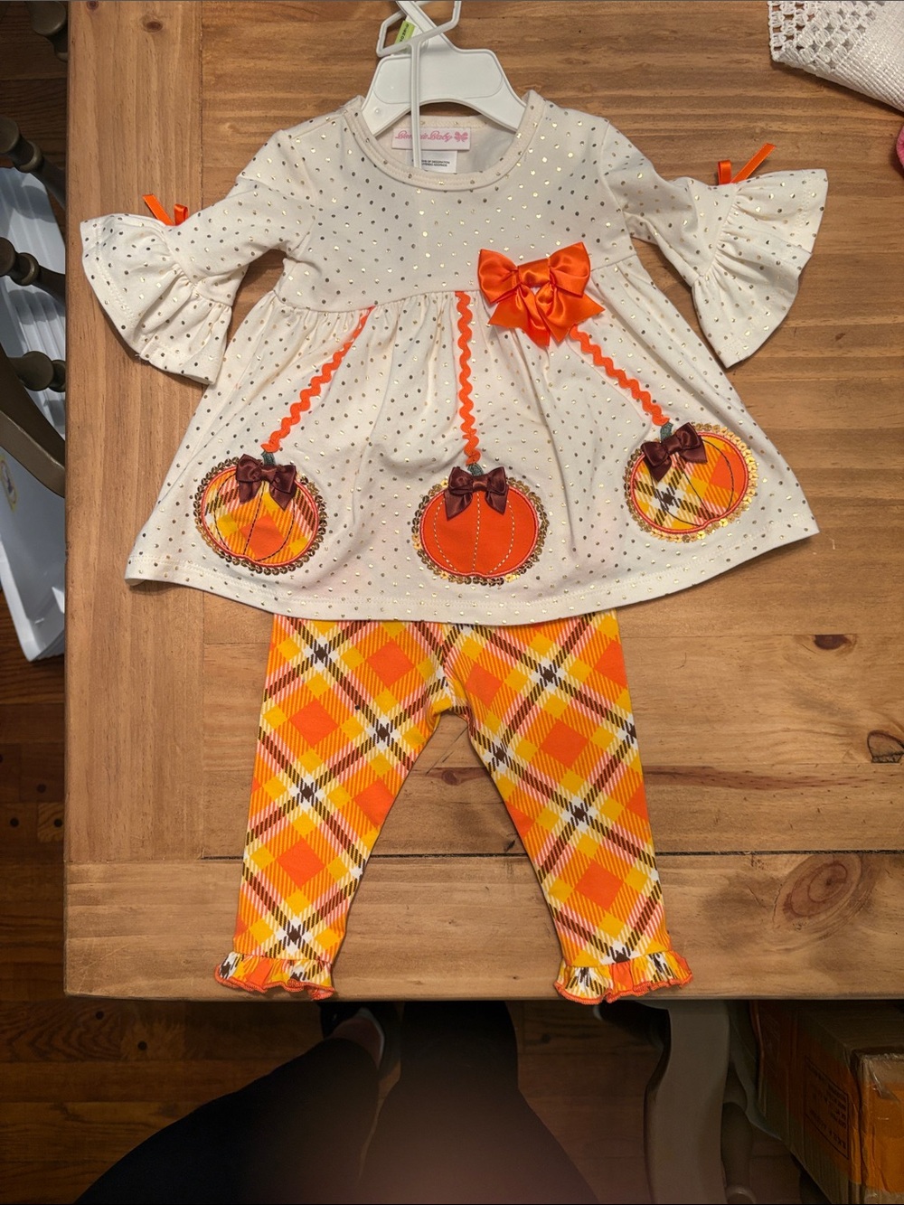 Bonnie Baby Cream Tunic with Orange Pumpkin Appliqués & Plaid Leggings